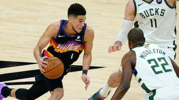 1625645552563074945.jpg devin-booker-and-kris-middleton.jpg